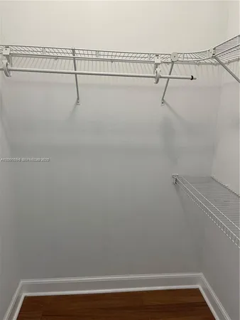 a view of a room with racks on the wall