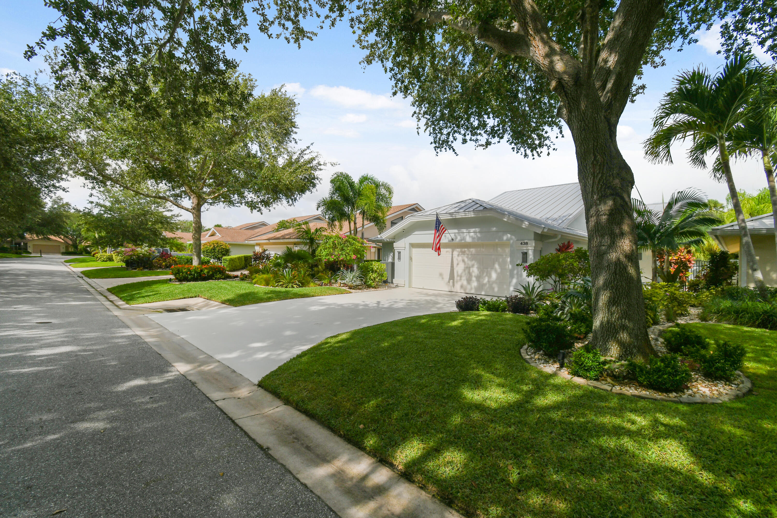 438 River Edge Road Jupiter, FL 33477 - Photo 5 of 80 View of home and street