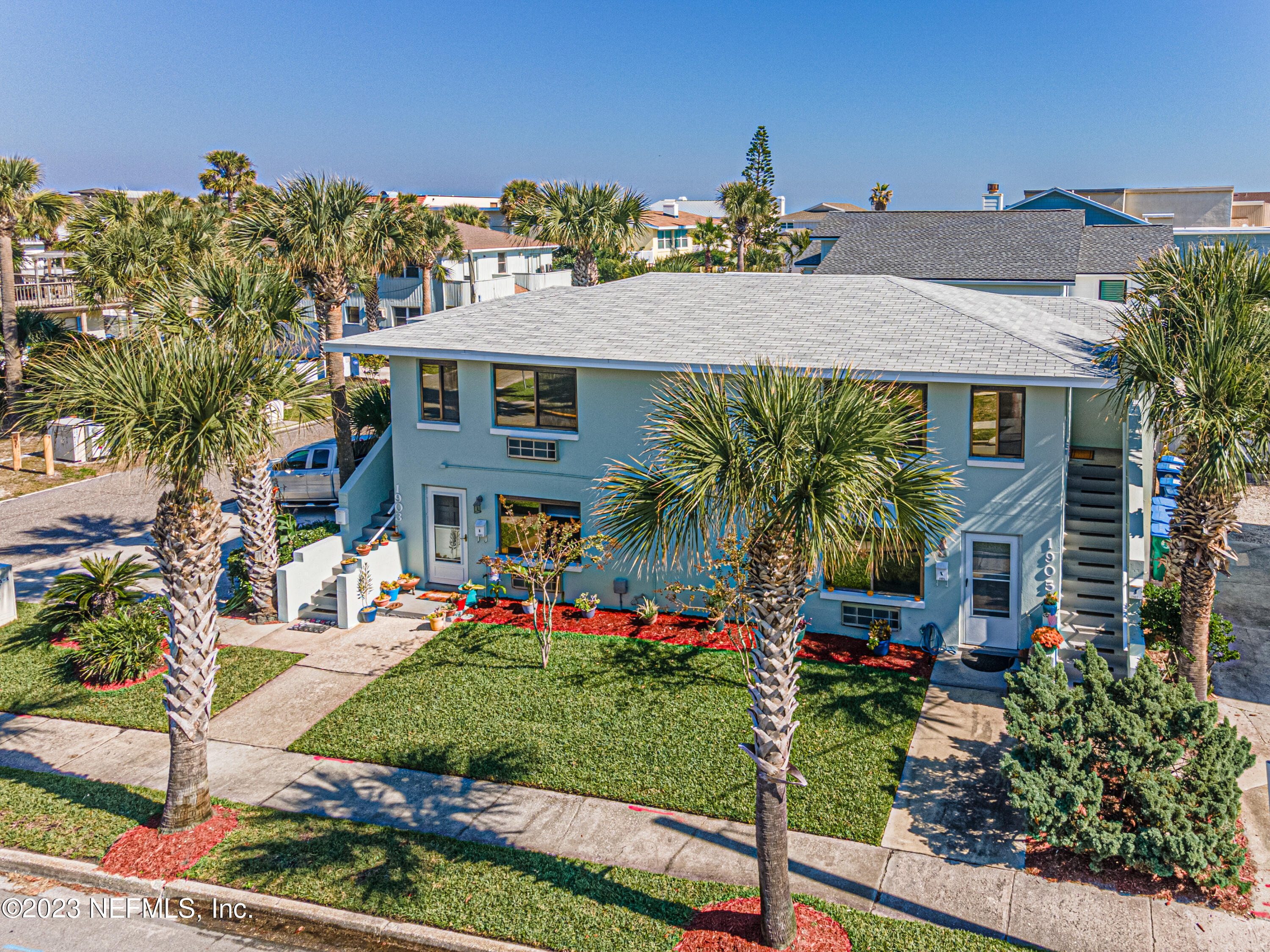 1907 First Street Neptune Beach, FL 32266 - Photo 22 of 29 a view of a house with a garden