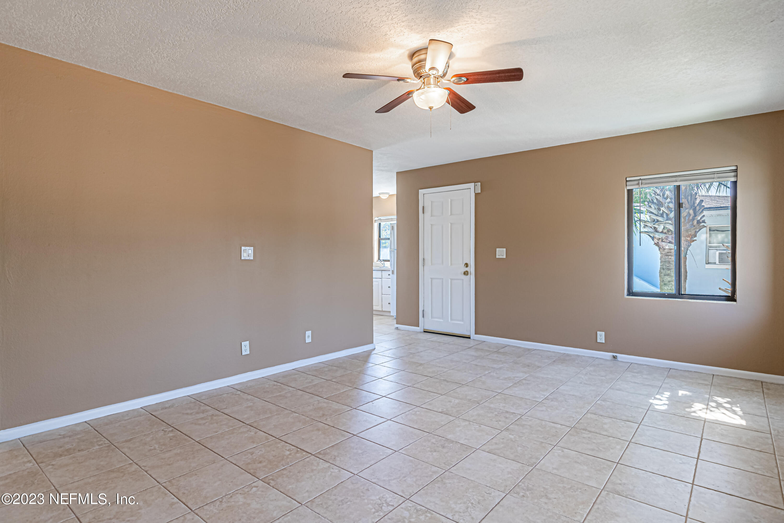 1907 First Street Neptune Beach, FL 32266 - Photo 8 of 29 a view of an empty room with a window