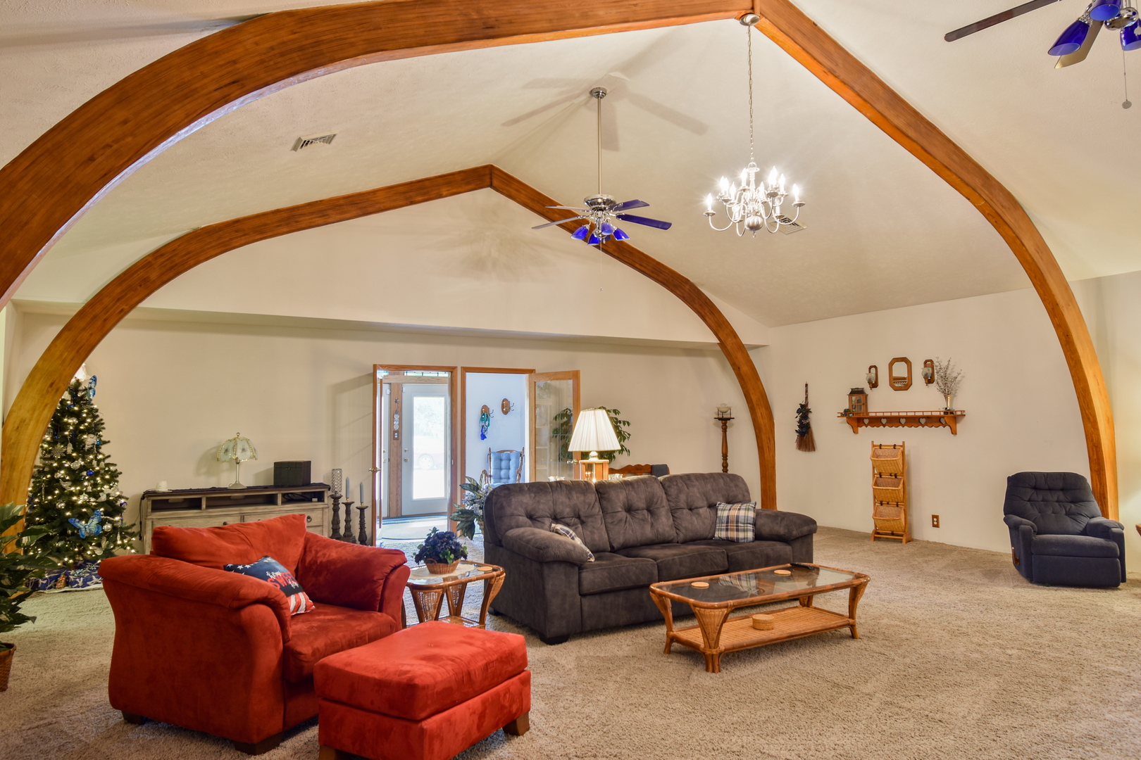 103 South 4th Street Chatsworth, IL 60921 - Photo 29 of 70 a living room with furniture a couch and a chandelier