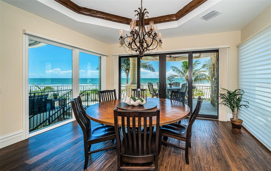 17824 Lee Avenue Redington Shores, FL 33708 - Photo 29 of 98 a view of a dining room with furniture window and wooden floor