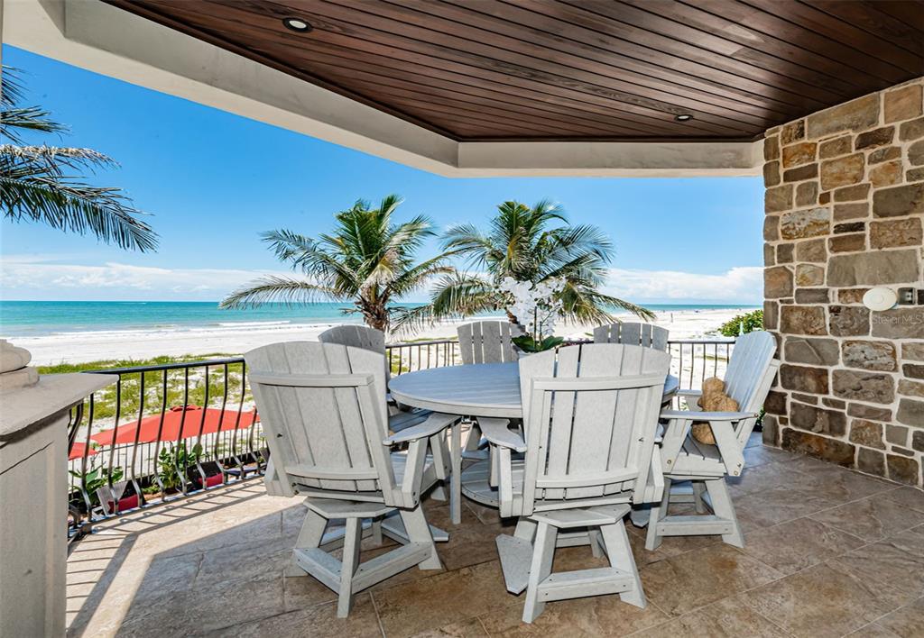 17824 Lee Avenue Redington Shores, FL 33708 - Photo 30 of 98 a dining room with furniture and a potted plant