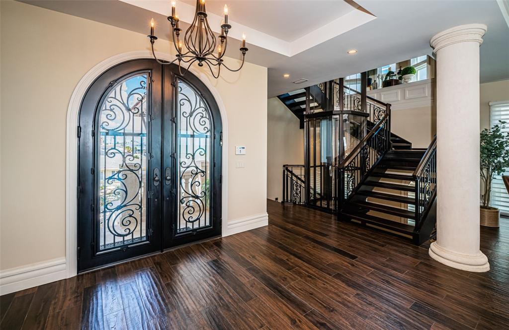 17824 Lee Avenue Redington Shores, FL 33708 - Photo 46 of 98 a view of entryway with wooden floor