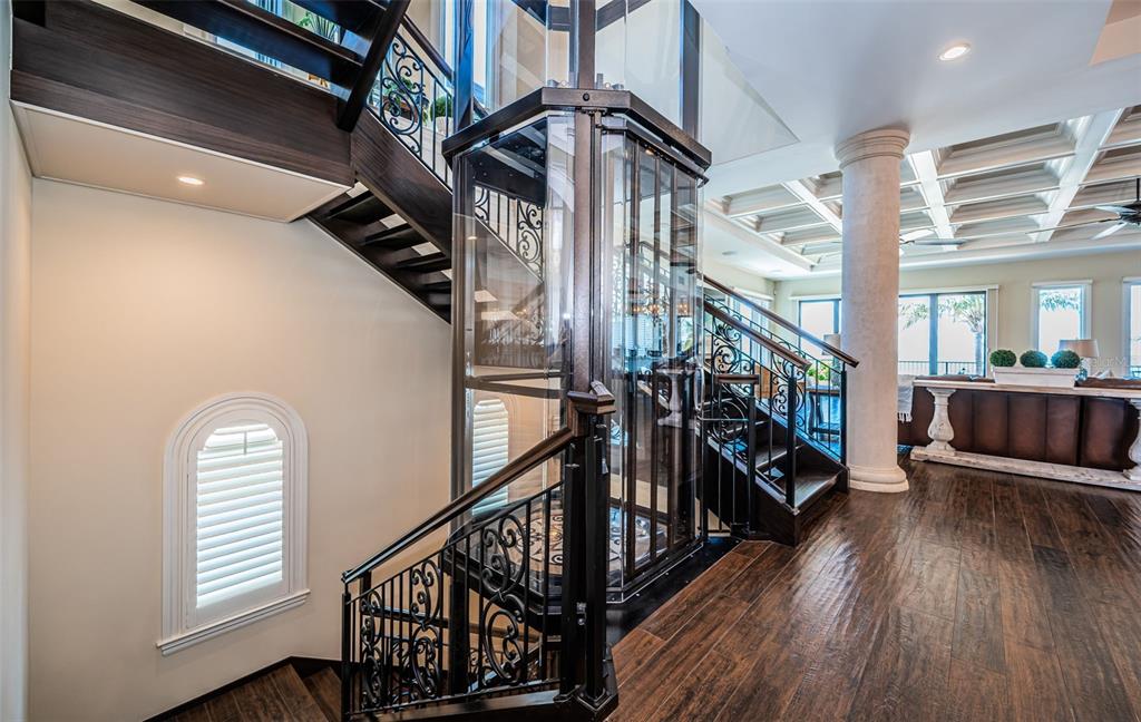 17824 Lee Avenue Redington Shores, FL 33708 - Photo 47 of 98 a view of entryway and hall with wooden floor