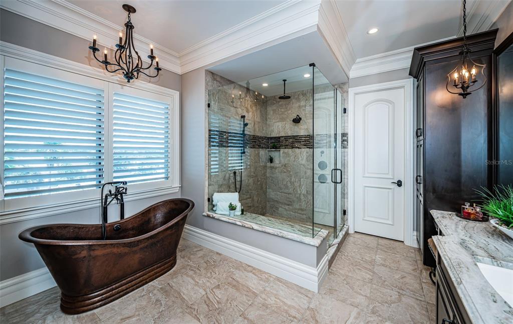 17824 Lee Avenue Redington Shores, FL 33708 - Photo 62 of 98 a living room with furniture and a chandelier