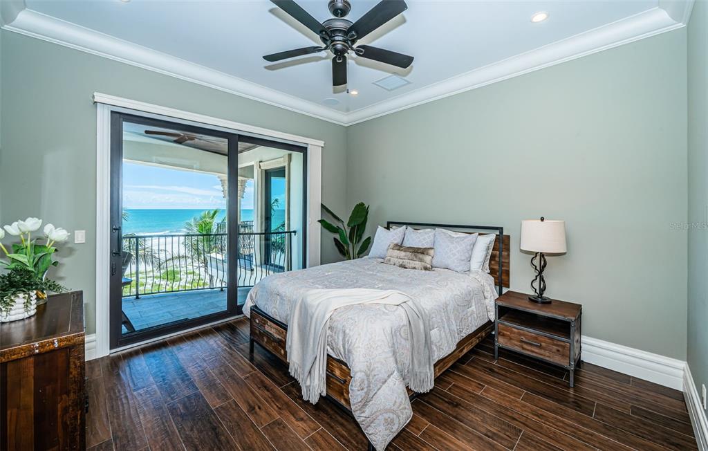 17824 Lee Avenue Redington Shores, FL 33708 - Photo 71 of 98 a bedroom with a bed and a large window