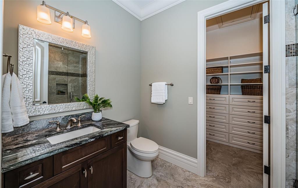 17824 Lee Avenue Redington Shores, FL 33708 - Photo 73 of 98 a bathroom with a granite countertop sink toilet and mirror