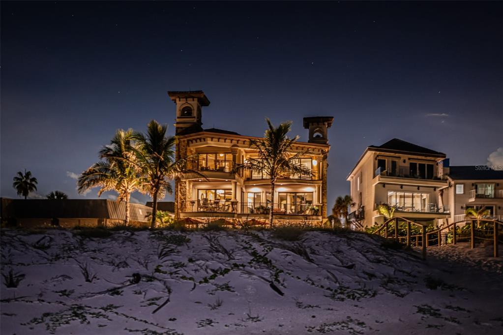 17824 Lee Avenue Redington Shores, FL 33708 - Photo 97 of 98 a front view of a house with large trees