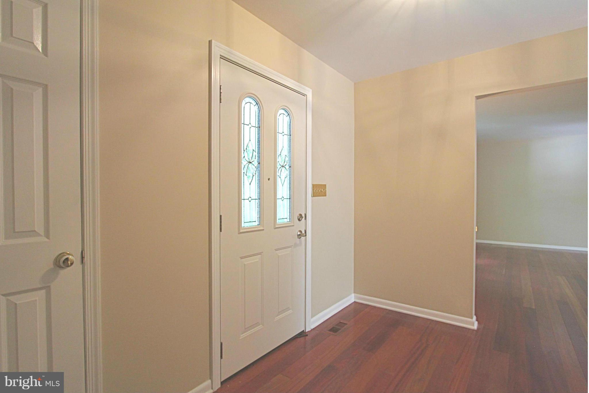36 Constantine Drive Phoenix, MD 21131 - Photo 3 of 30 a view of an empty room with wooden floor