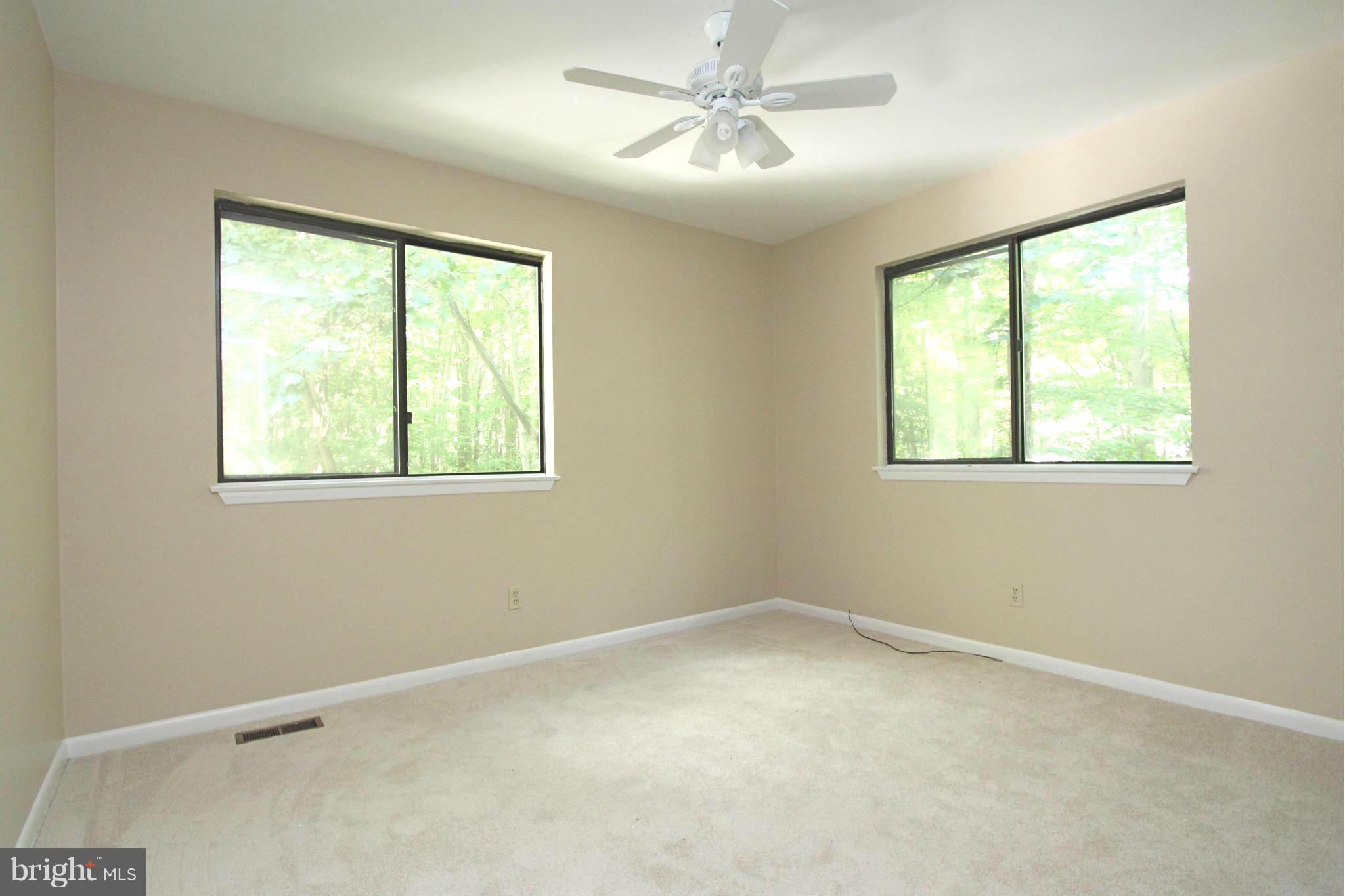 36 Constantine Drive Phoenix, MD 21131 - Photo 21 of 30 a view of an empty room with a window