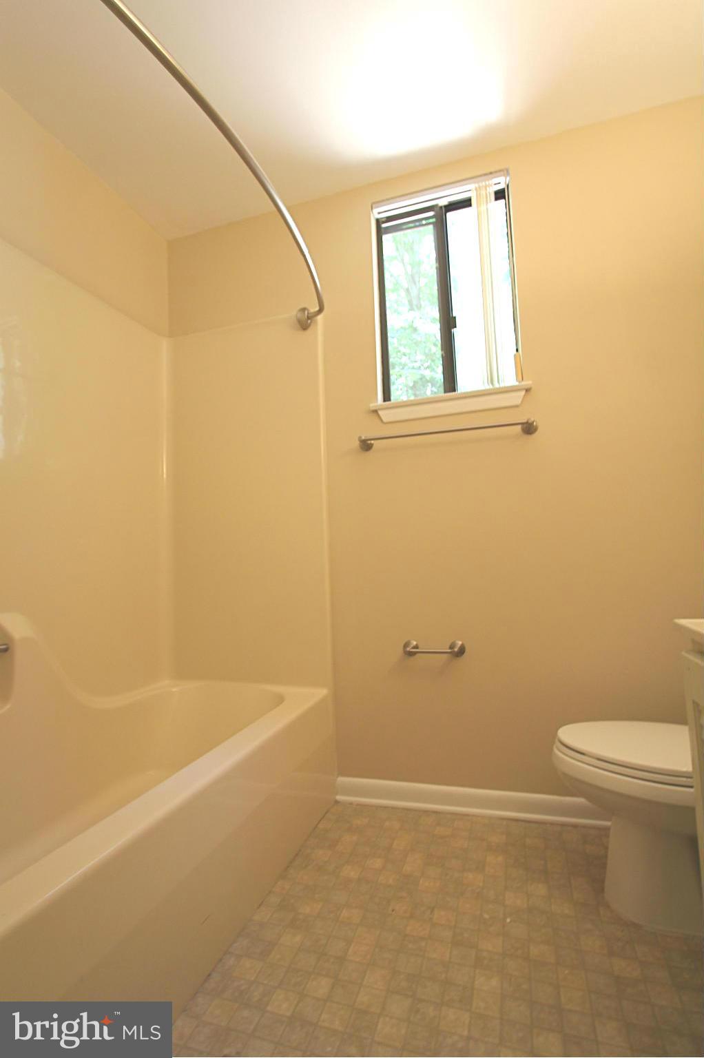 36 Constantine Drive Phoenix, MD 21131 - Photo 22 of 30 a bathroom with a toilet and a bathtub
