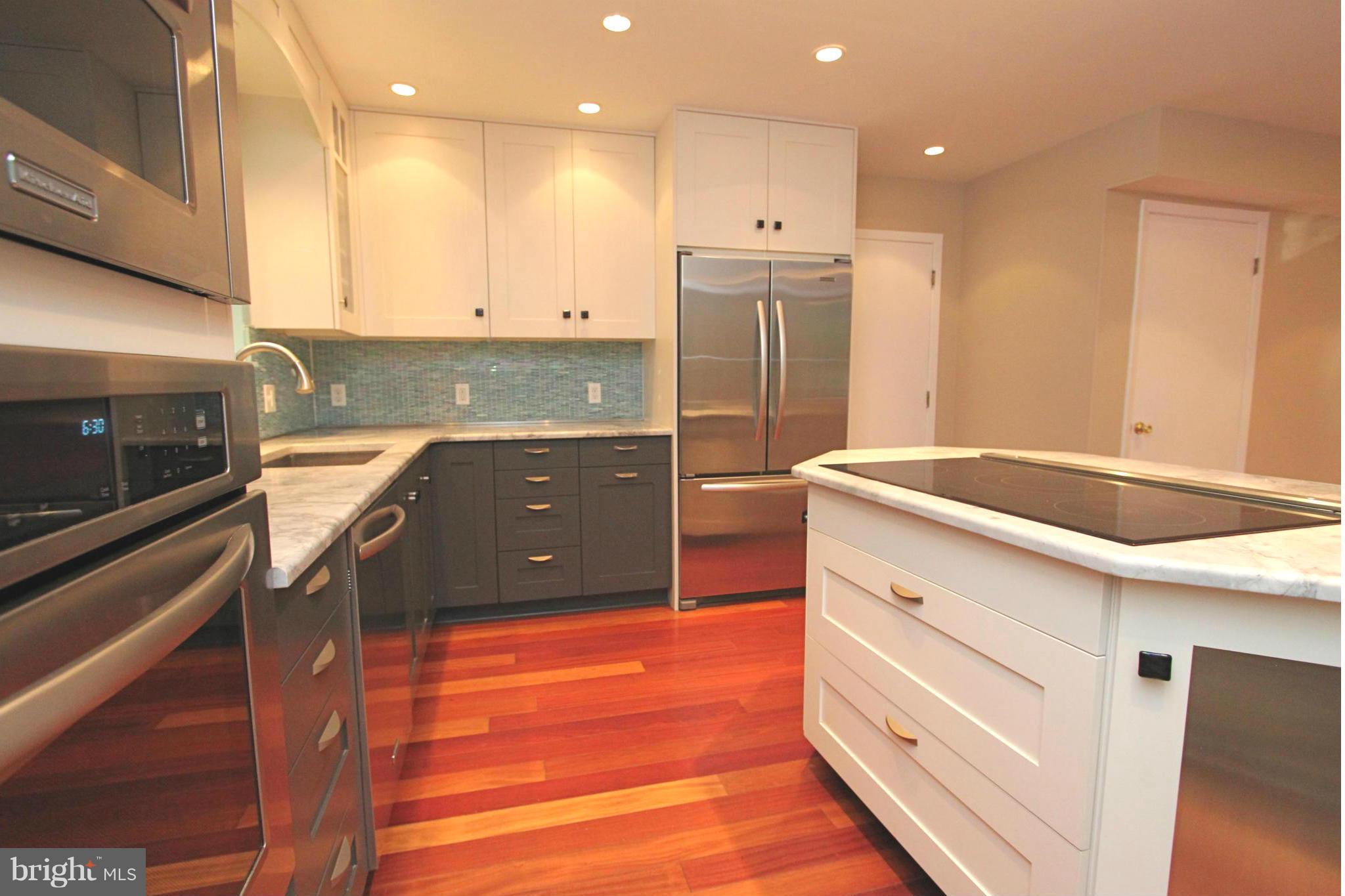 36 Constantine Drive Phoenix, MD 21131 - Photo 10 of 30 a kitchen with stainless steel appliances granite countertop a sink and a stove