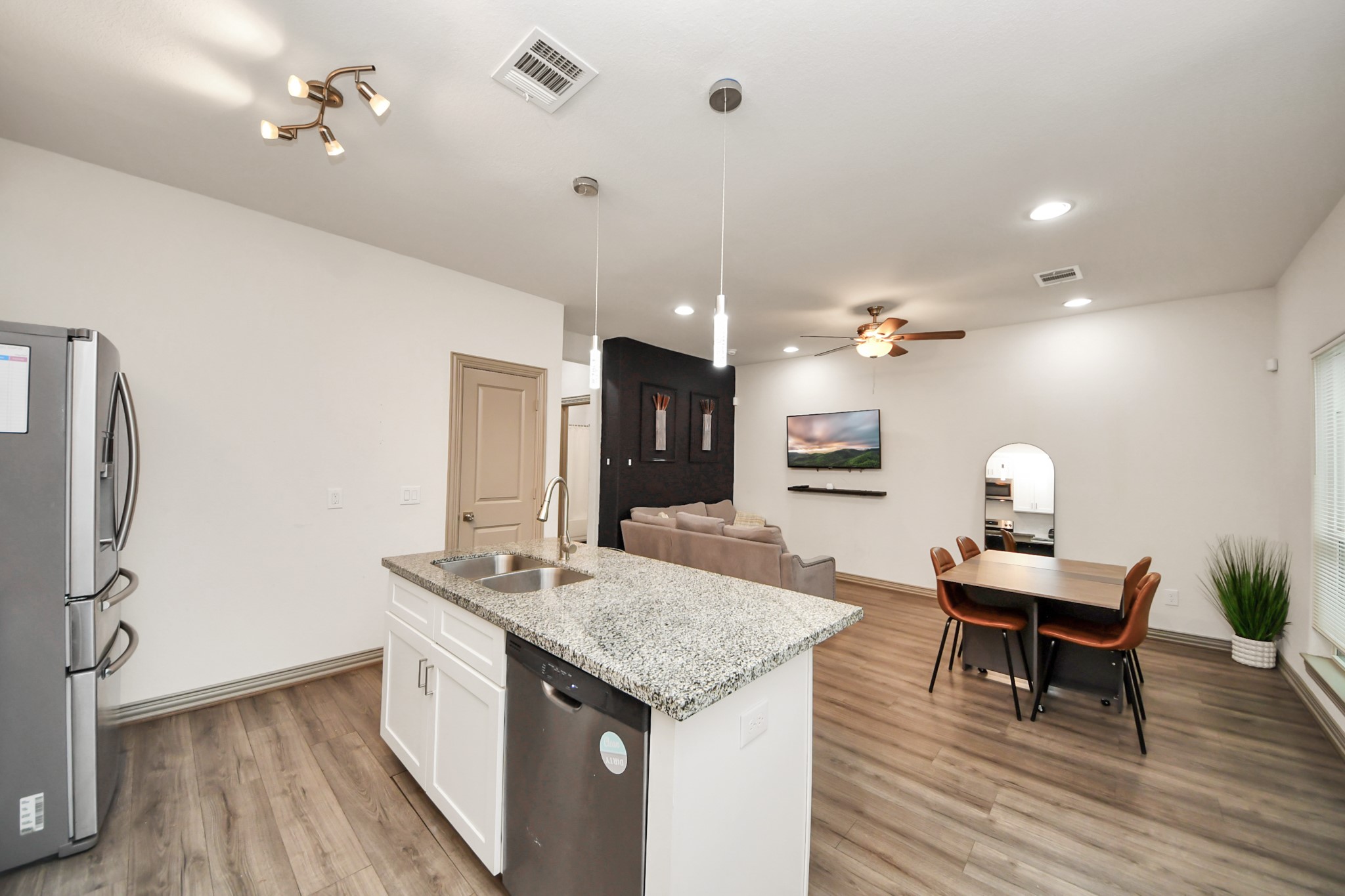 5334 Pershing Street Houston, TX 77033 - Photo 31 of 43 a living room with furniture and wooden floor