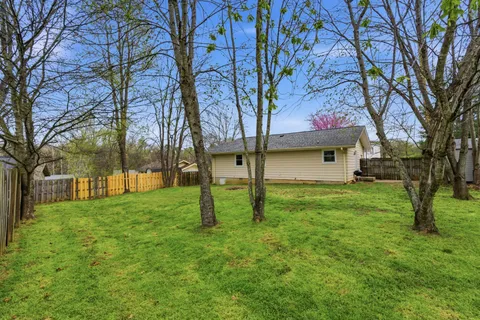 a view of a backyard with a garden