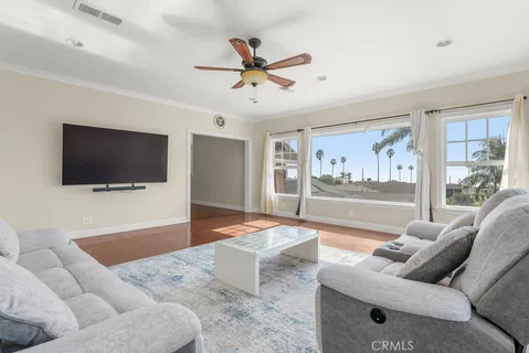 a view of hallway with wooden floor