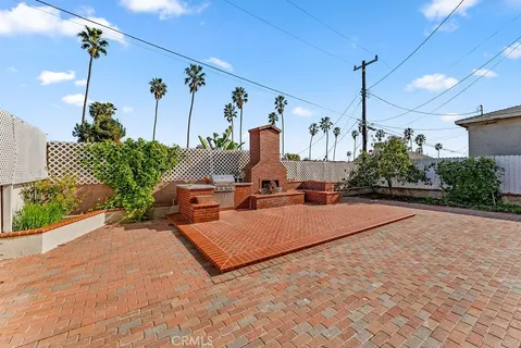 an aerial view of a house with a ocean view