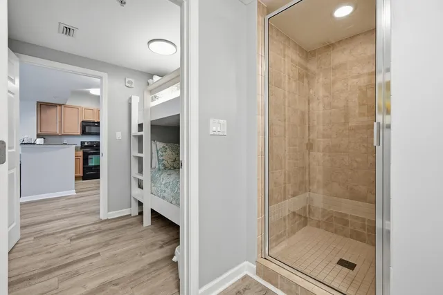 a view of a hallway with washer and dryer