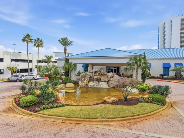 a view of a swimming pool with an ocean view