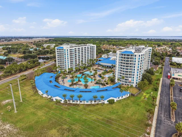 a view of a swimming pool with an ocean view