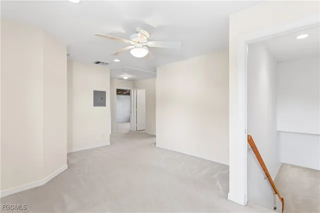 a view of a livingroom with a staircase