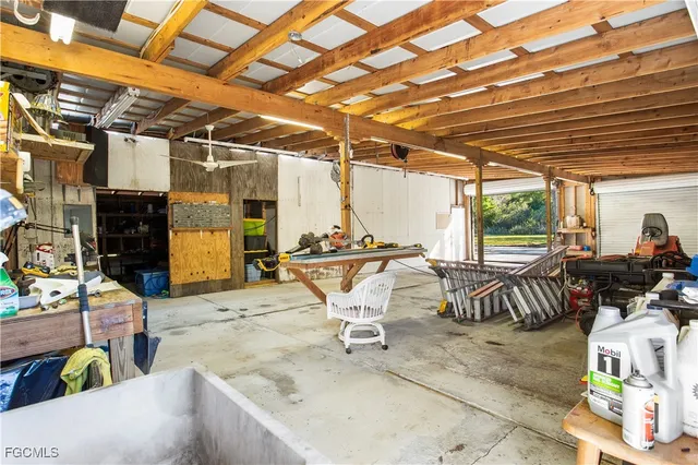 a view of a patio with a table and chairs