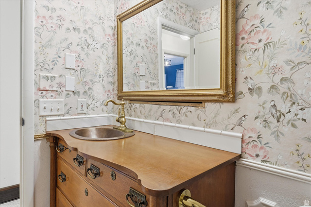 165 Main Street Georgetown, ID 83239 - Photo 20 of 50 Bathroom with vanity and wallpapered walls