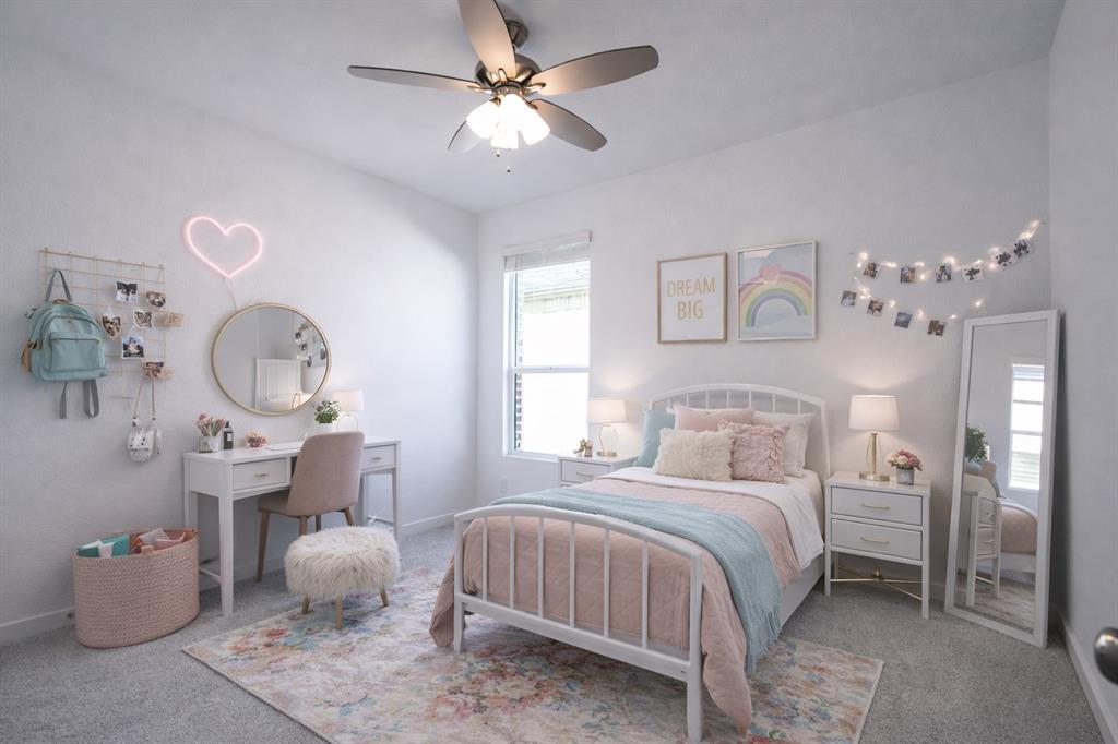 3017 Dutch Road Providence Village, TX 76227 - Photo 13 of 32 Carpeted bedroom with a ceiling fan and baseboards