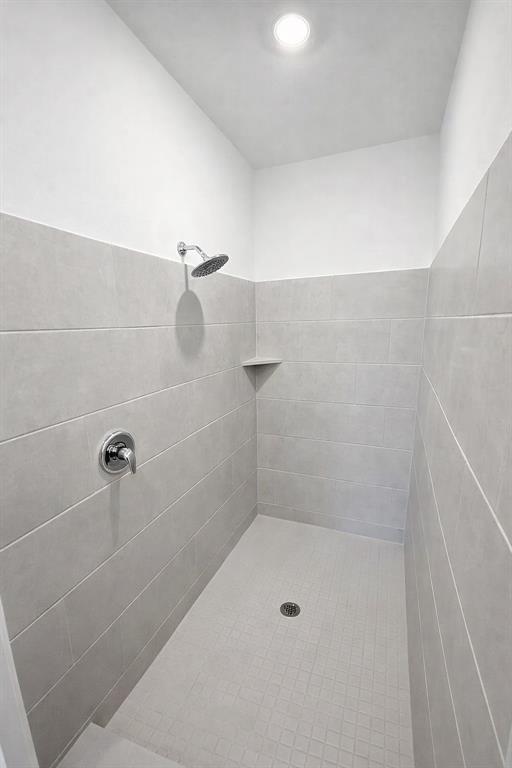 3017 Dutch Road Providence Village, TX 76227 - Photo 21 of 32 Bathroom with tiled shower