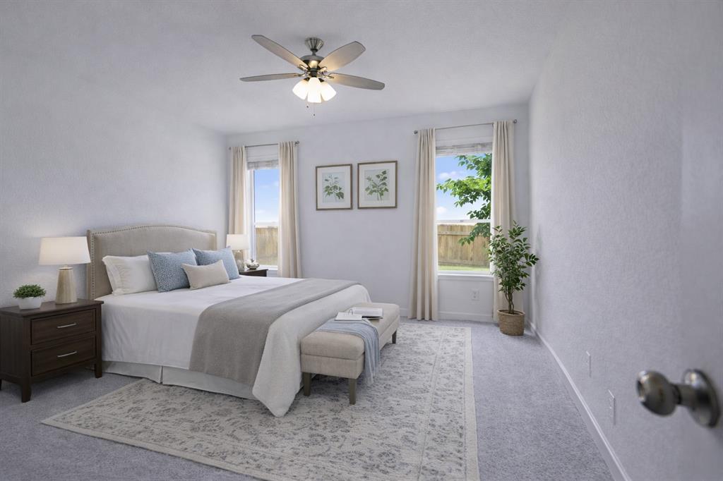 3017 Dutch Road Providence Village, TX 76227 - Photo 28 of 32 Bedroom featuring light carpet, ceiling fan, and a textured wall
