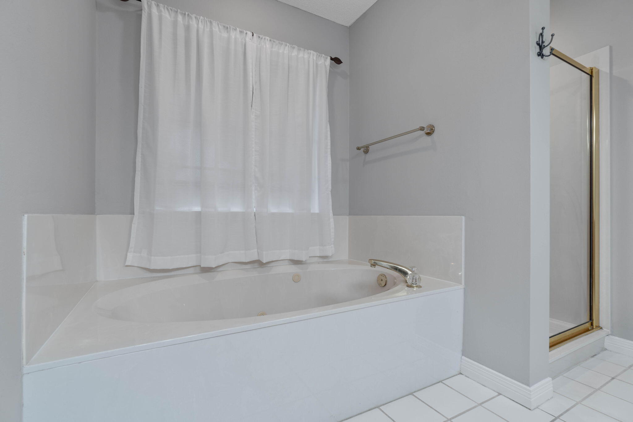 3816 Indigo Circle Destin, FL 32541 - Photo 27 of 36 a white bath tub sitting next to a shower