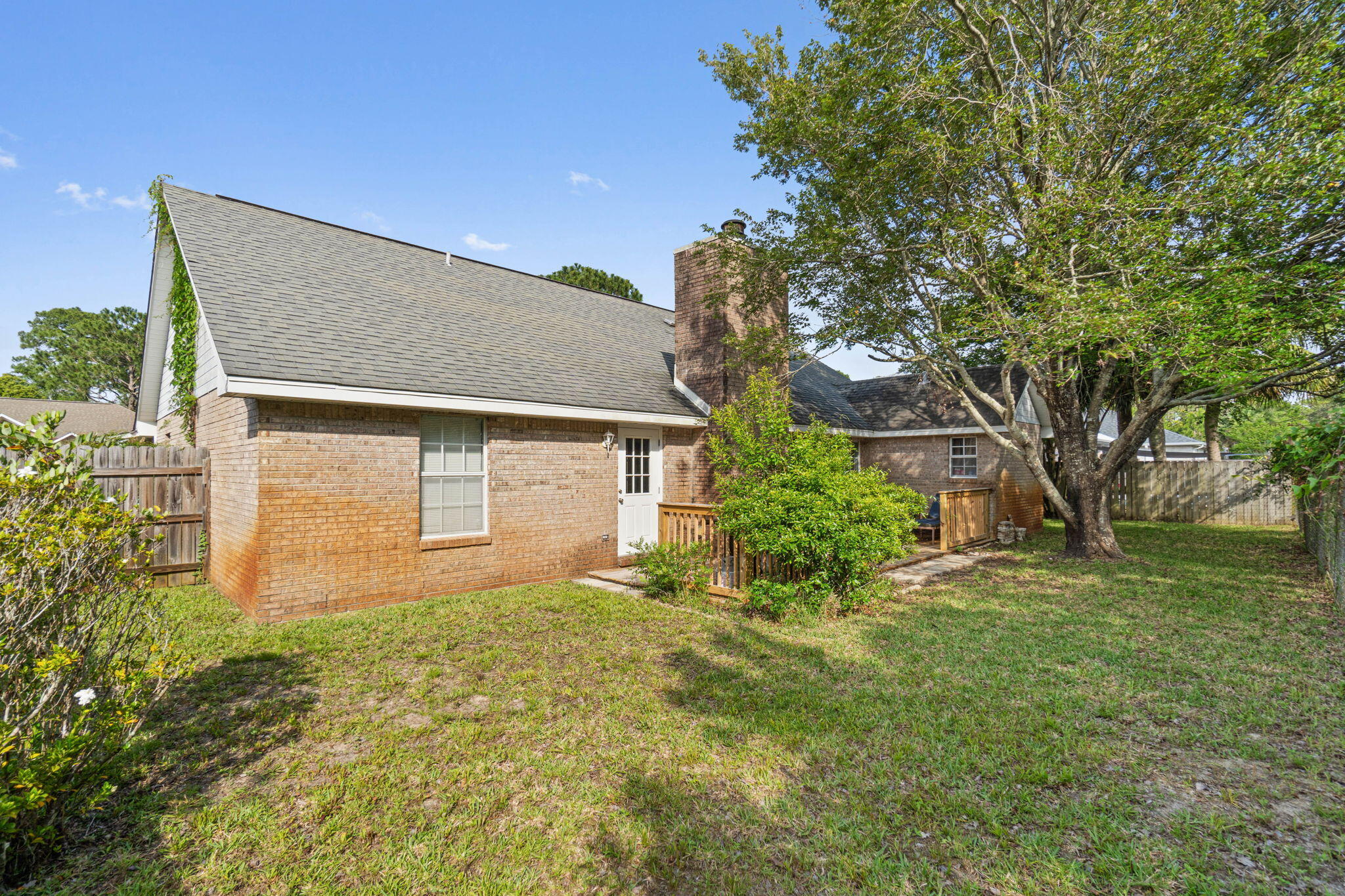 3816 Indigo Circle Destin, FL 32541 - Photo 32 of 36 a view of a house with a yard