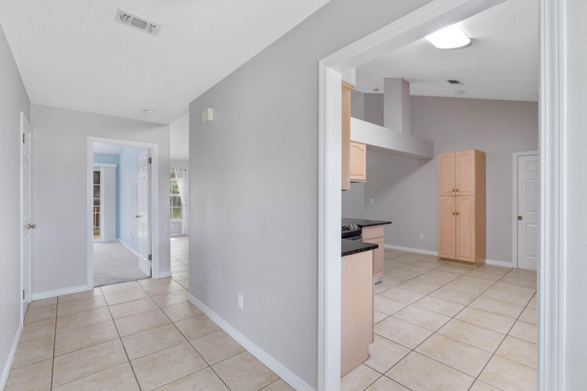 3816 Indigo Circle Destin, FL 32541 - Photo 4 of 36 a view of an empty room and a hallway