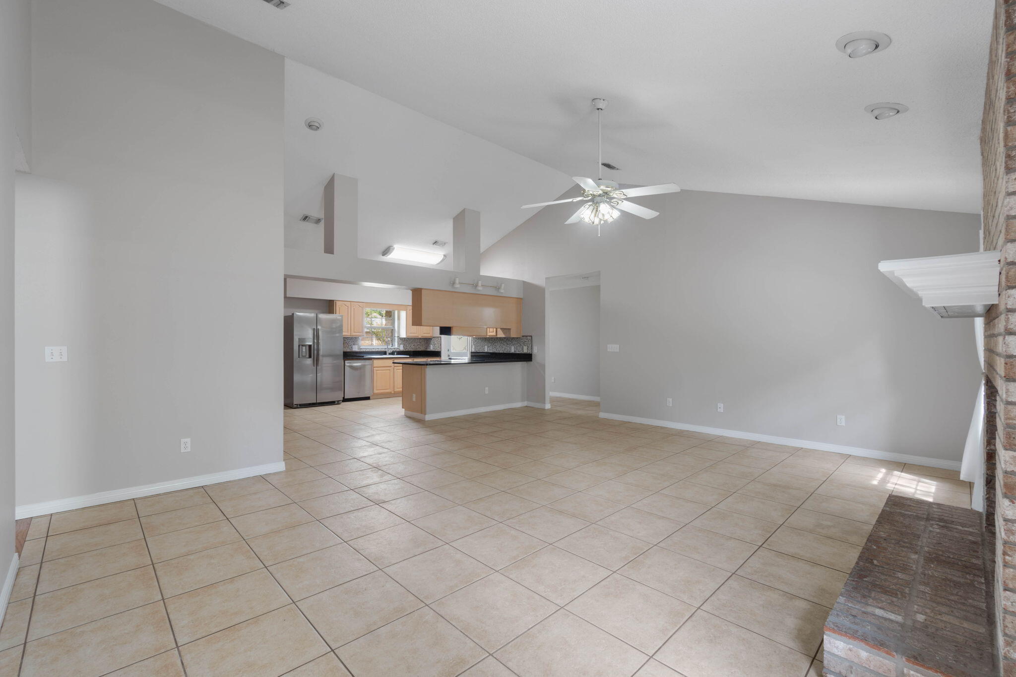 3816 Indigo Circle Destin, FL 32541 - Photo 9 of 36 a view of kitchen with furniture and refrigerator