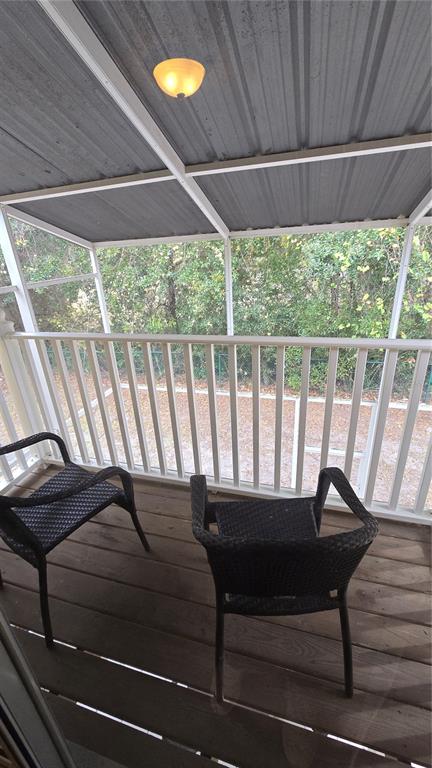 1013 Park Ridge Circle Kissimmee, FL 34746 - Photo 19 of 74 a view of a balcony with furniture