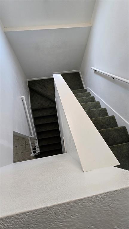 1013 Park Ridge Circle Kissimmee, FL 34746 - Photo 32 of 74 a view of stair and an empty room