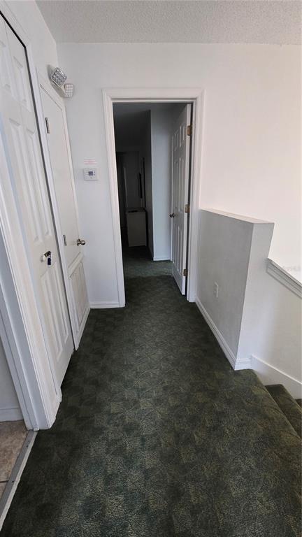 1013 Park Ridge Circle Kissimmee, FL 34746 - Photo 33 of 74 an entryway door with a hallway in the house