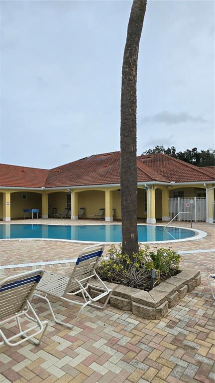 1013 Park Ridge Circle Kissimmee, FL 34746 - Photo 45 of 74 a front view of house with yard