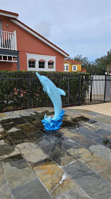 1013 Park Ridge Circle Kissimmee, FL 34746 - Photo 56 of 74 a front view of a house with a yard