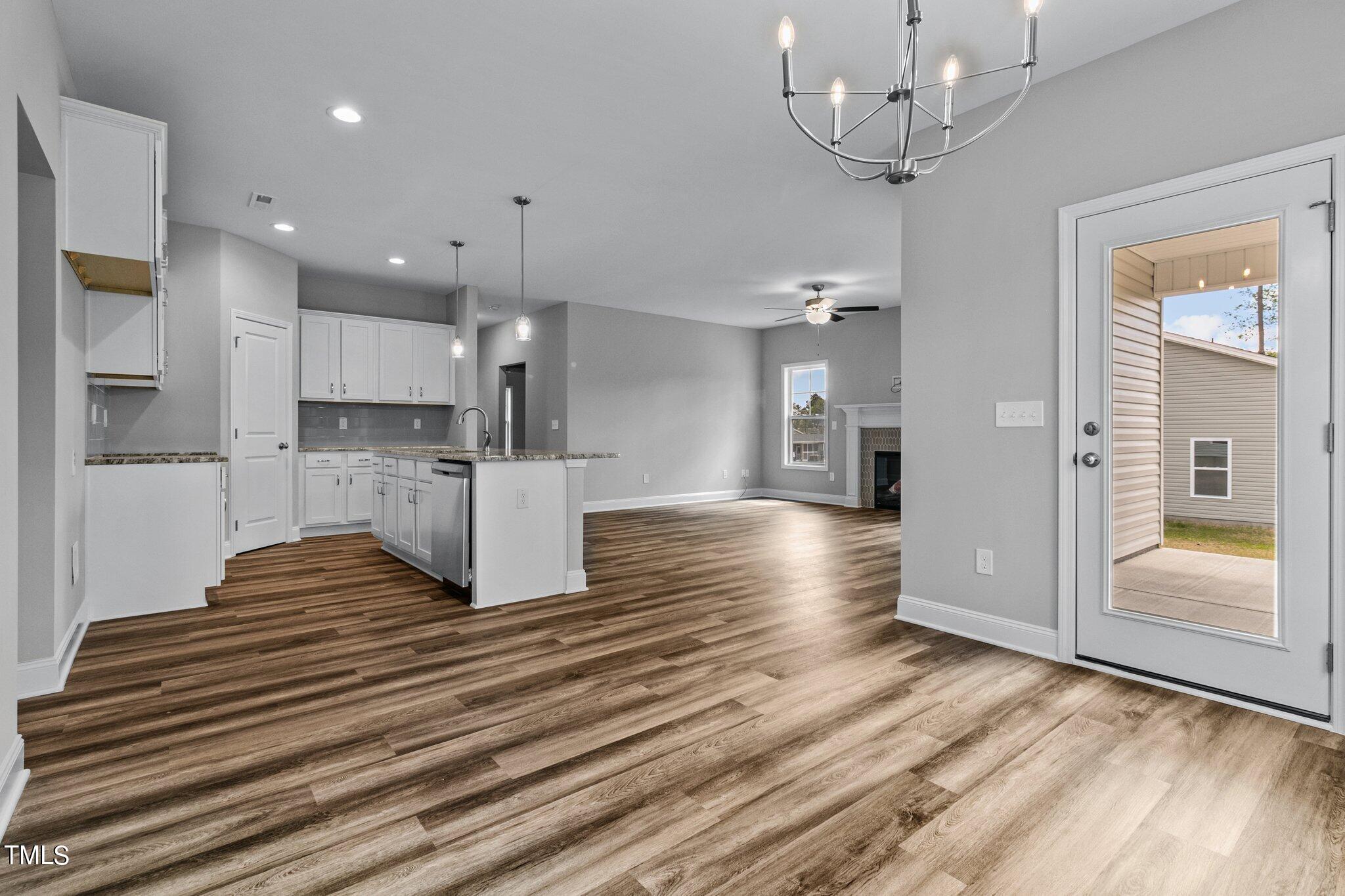 75 Regis Lane Coats, NC 27521 - Photo 16 of 37 a view of kitchen with refrigerator and microwave