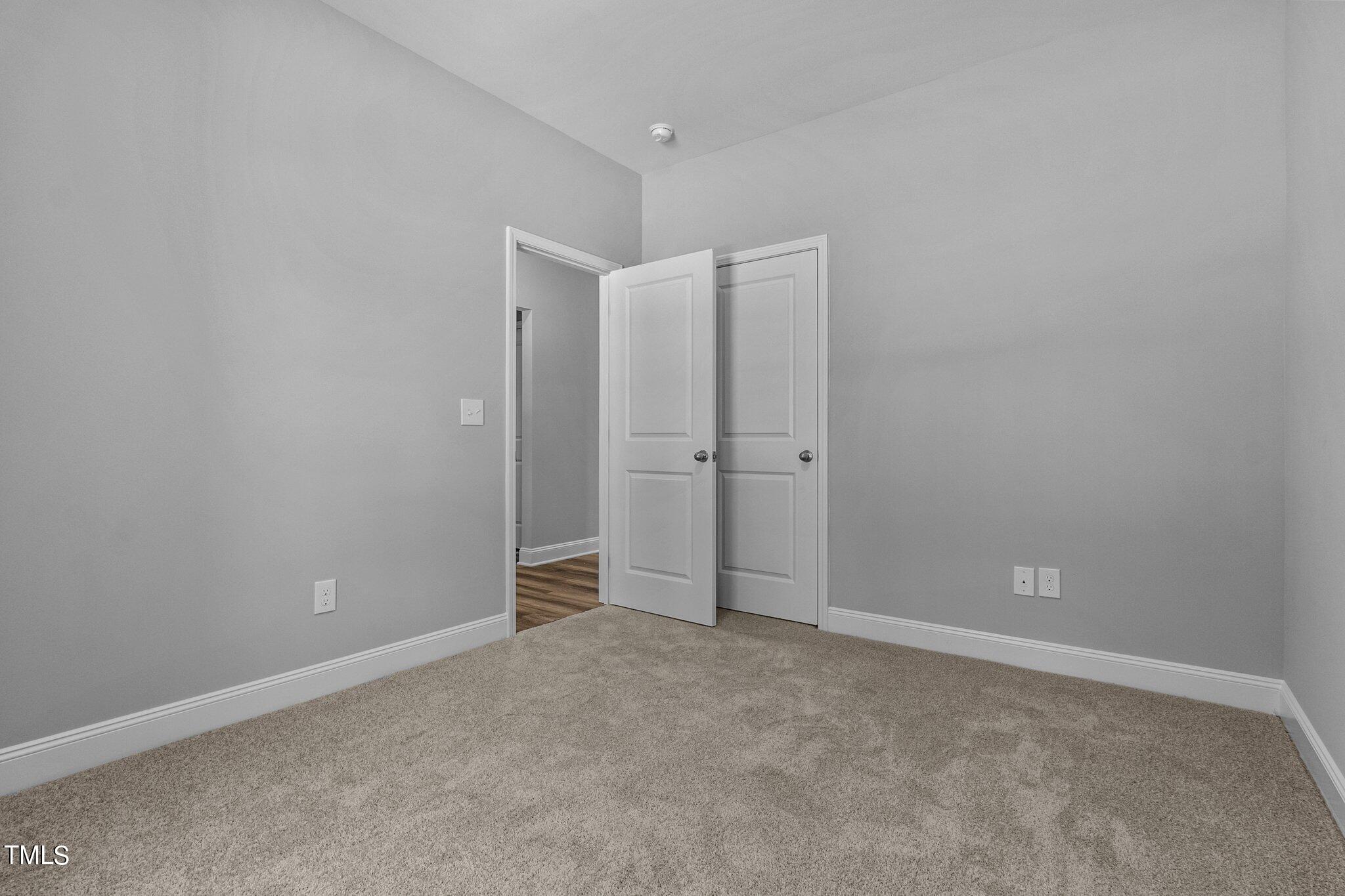 75 Regis Lane Coats, NC 27521 - Photo 18 of 37 a view of an empty room