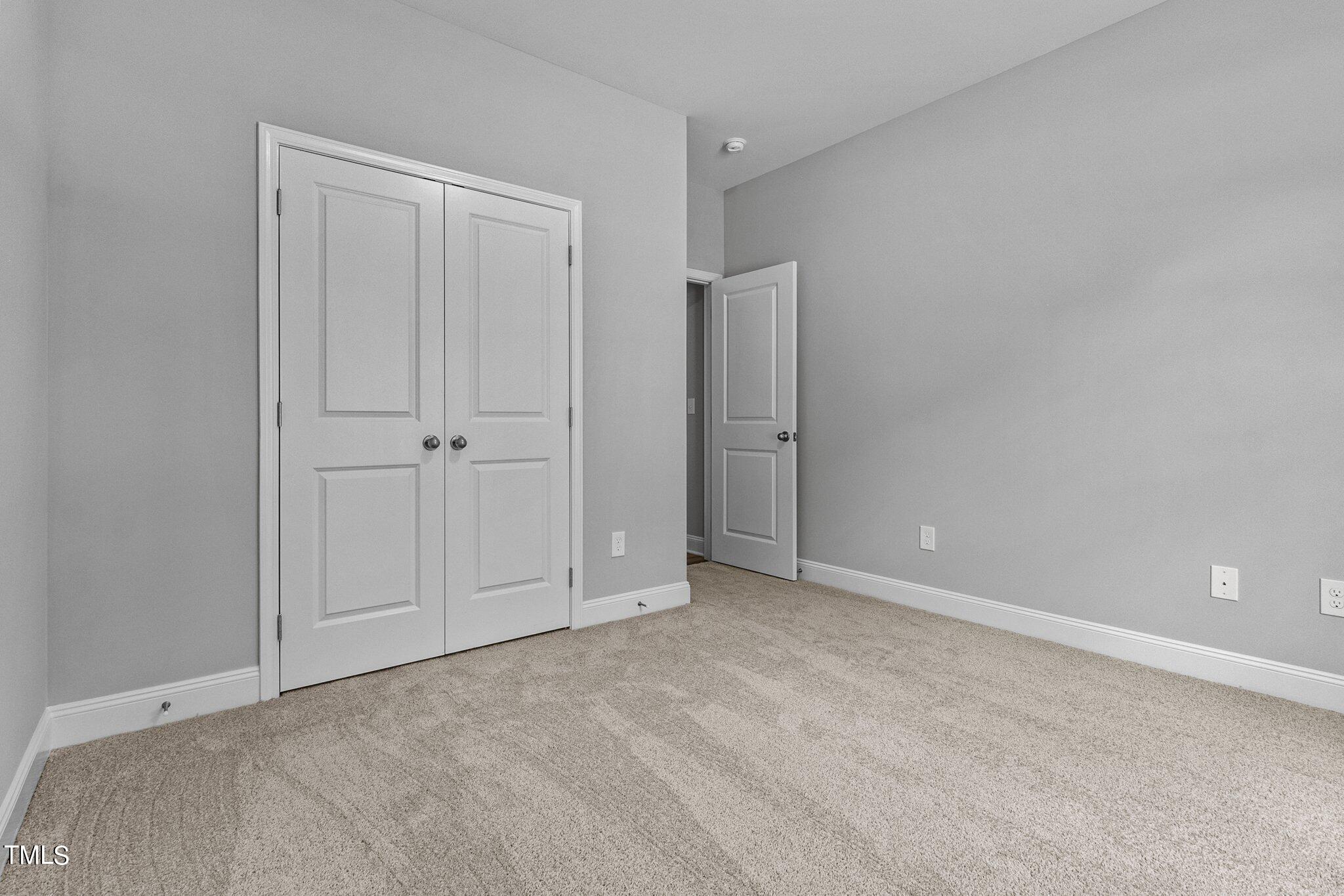 75 Regis Lane Coats, NC 27521 - Photo 20 of 37 a view of an empty room