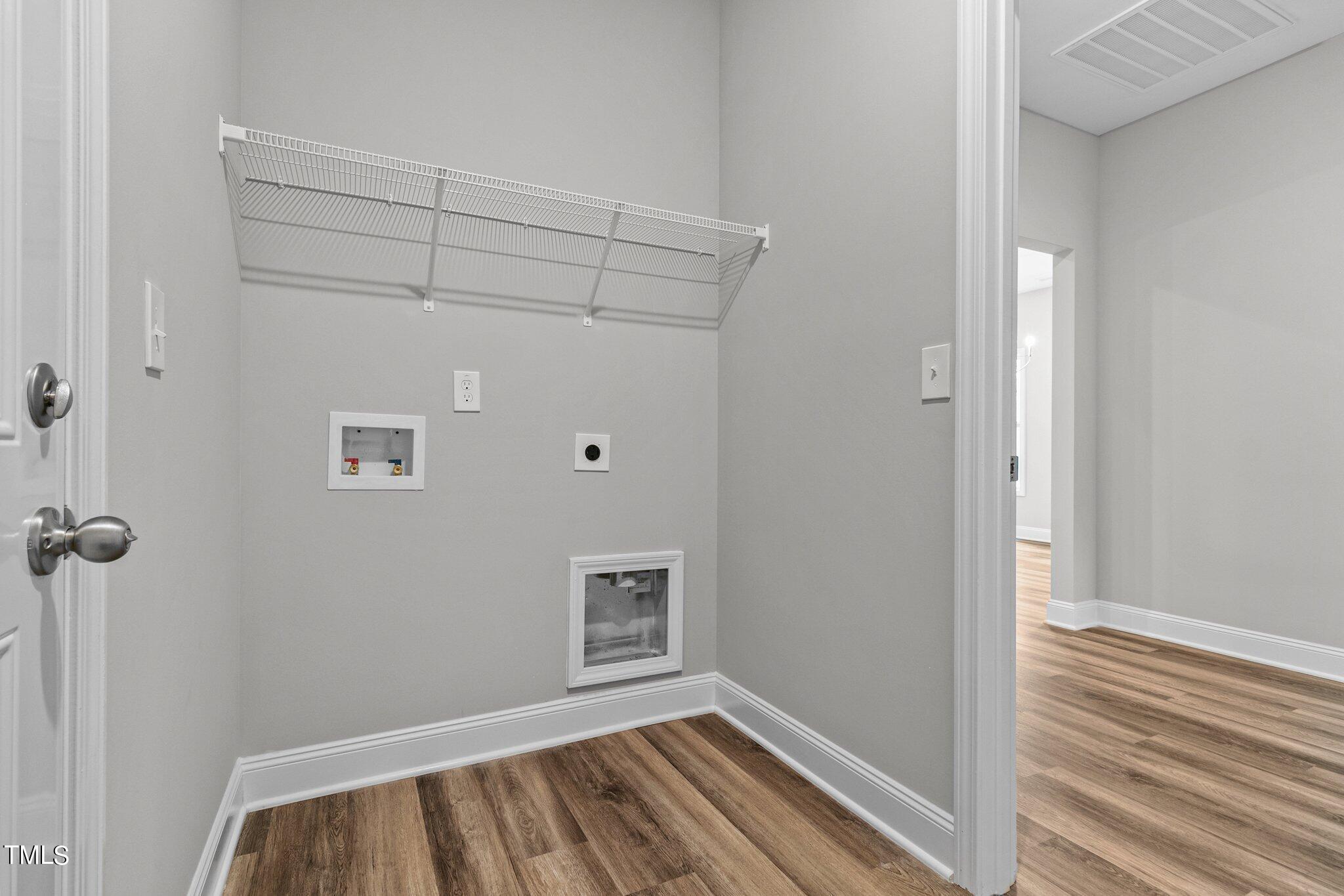 75 Regis Lane Coats, NC 27521 - Photo 24 of 37 a view of a room with wooden floor