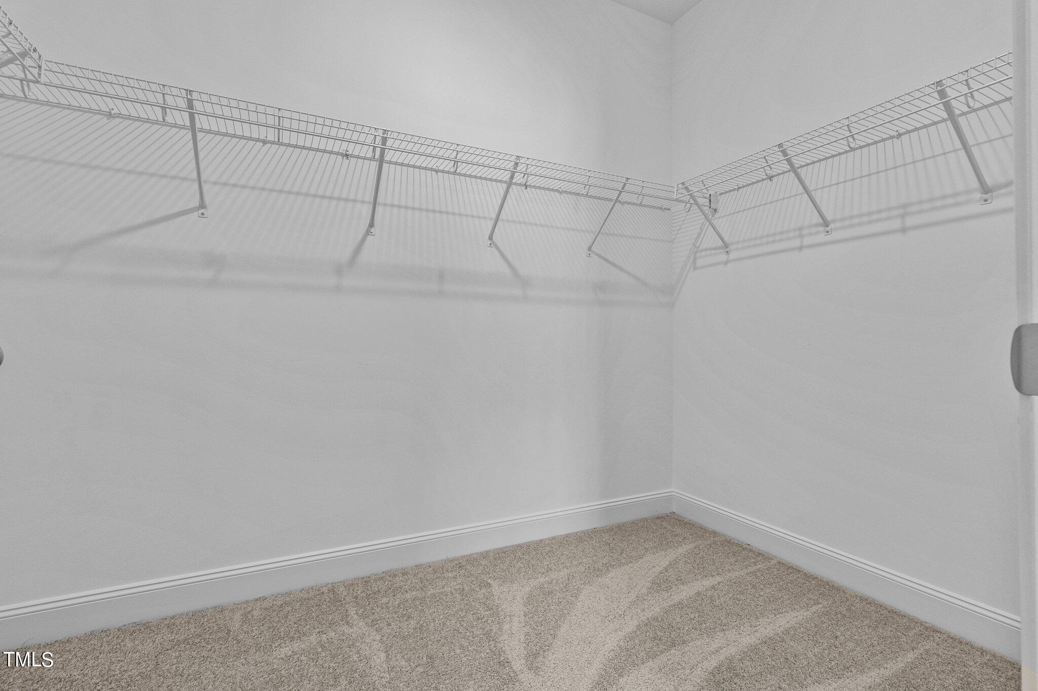 75 Regis Lane Coats, NC 27521 - Photo 29 of 37 a view of a room with racks on the wall