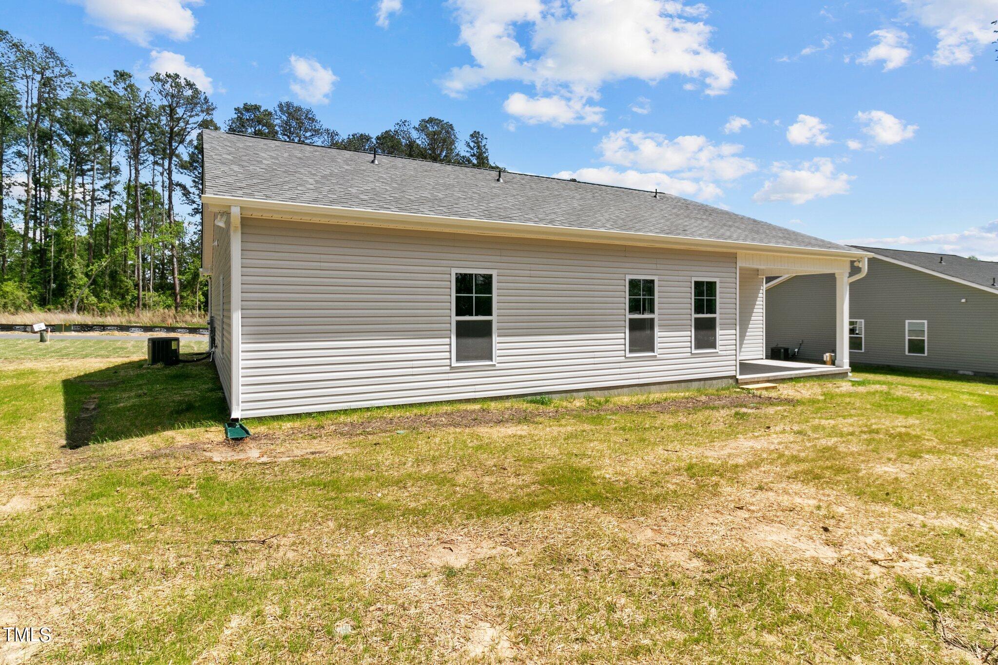 75 Regis Lane Coats, NC 27521 - Photo 33 of 37 a view of a backyard