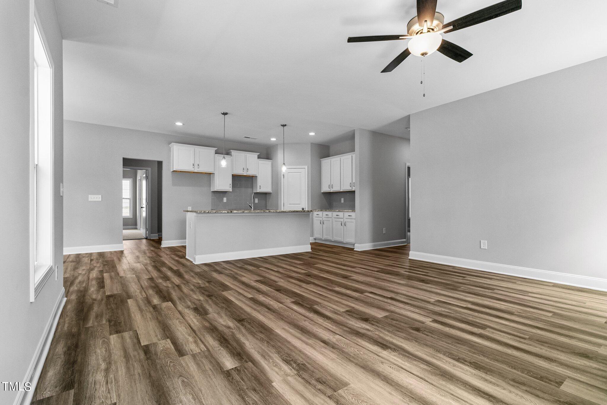 75 Regis Lane Coats, NC 27521 - Photo 7 of 37 a view of a kitchen with a dishwasher and cabinets