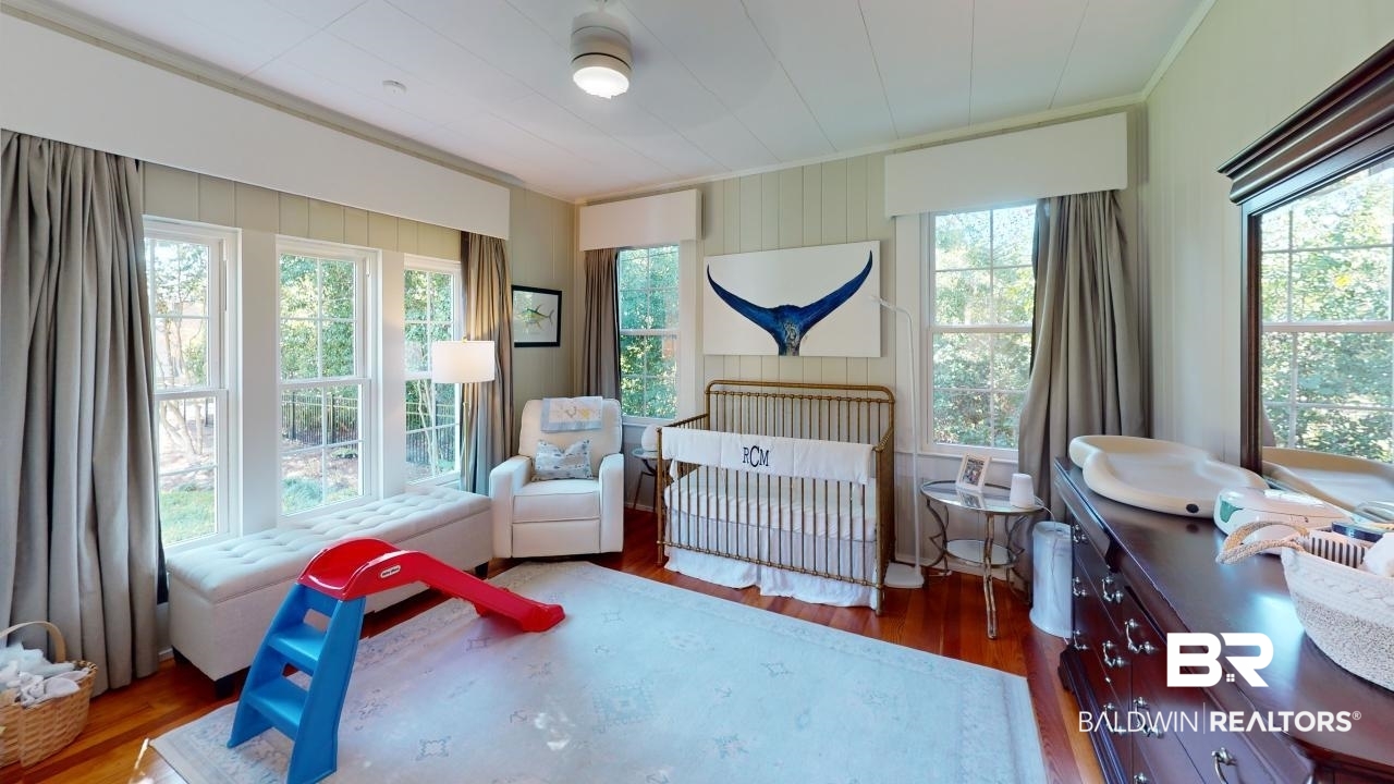 4358 Stein Street Mobile, AL 36608 - Photo 9 of 29 Bedroom with multiple windows and a crib