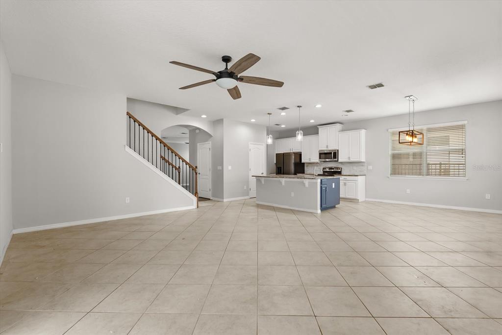 4345 Saltmarsh Sparrow Drive Windermere, FL 34786 - Photo 14 of 46 a view of a kitchen with furniture and windows