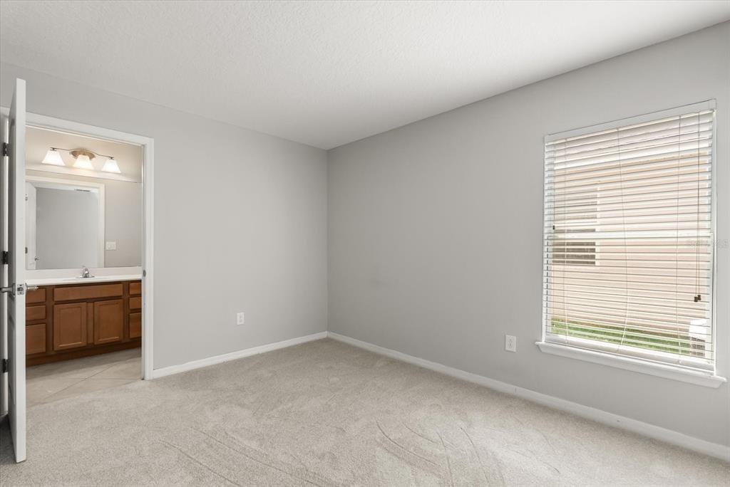 4345 Saltmarsh Sparrow Drive Windermere, FL 34786 - Photo 17 of 46 a view of an empty room and window