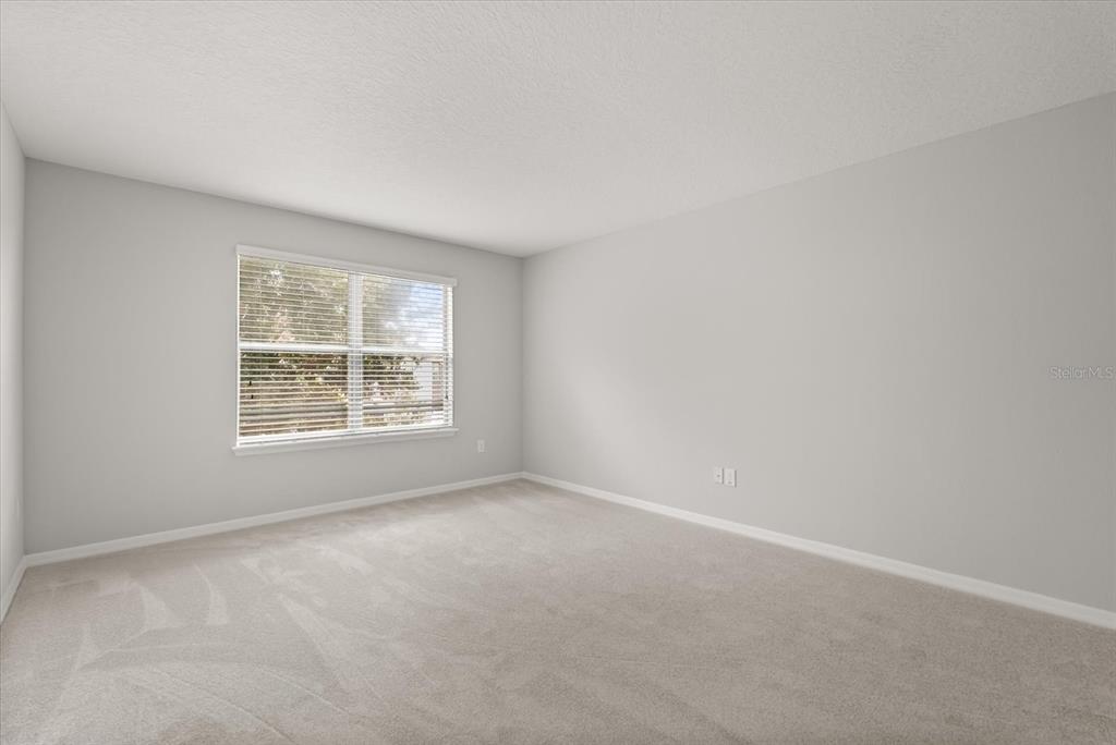 4345 Saltmarsh Sparrow Drive Windermere, FL 34786 - Photo 27 of 46 an empty room with a window